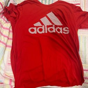 Red shirt with a white logo